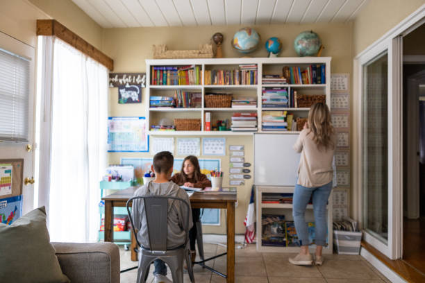 Mom and her children homeschooling