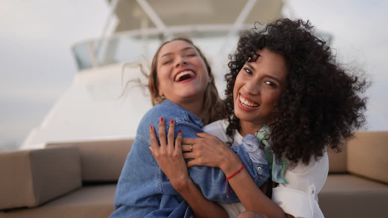 Portrait of girlfriends while yachting