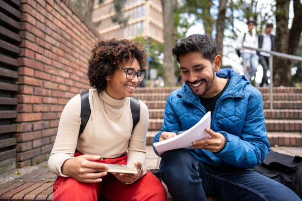 istock Young university students studying on stair outdoors 1479824070