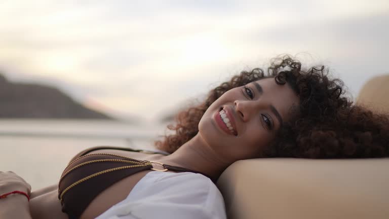 Portrait of young woman during a yacht trip