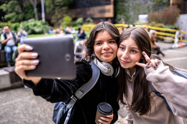 istock Young university students taking a selfie at university 1479825648