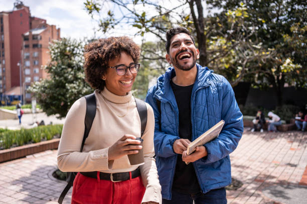 istock Young university students walking and talk outdoors 1479829012