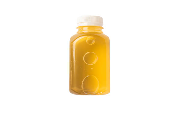 Detox tea in a clear plastic bottle. Studio photo taken on a white background.