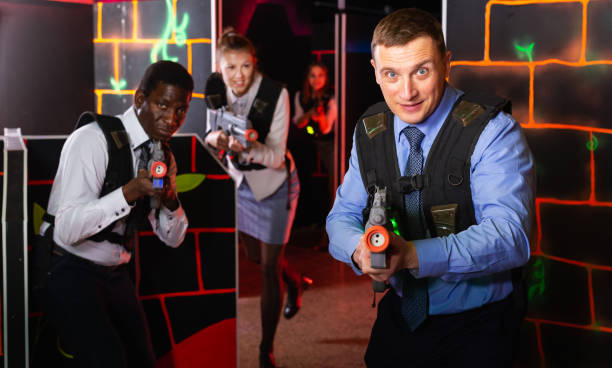 istock men and women co-workers having corporate entertainment 1479854541