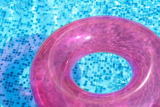 istock Inflatable ring floating on water in swimming pool, closeup 1479858588