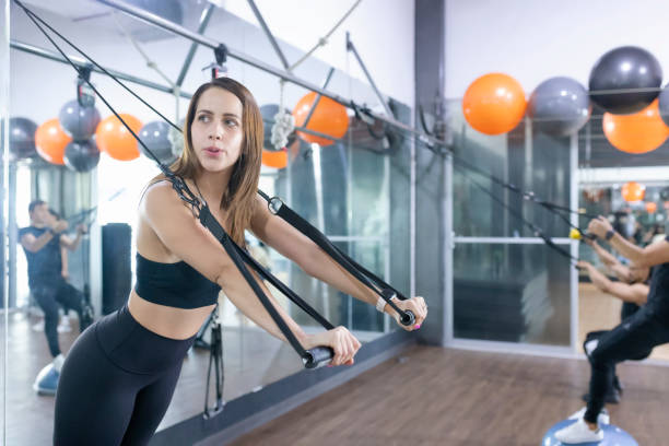 istock Woman doing full body resistance exercise 1479870961