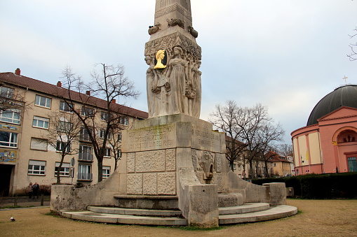 Alice Obelisk, memorial dedicated to Grand Duchess Alice, installed in 1902 at Wilhelminenplatz, close-up view of the decorated base in the early evening light, Darmstadt, Germany