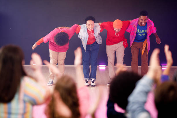 istock Group of dancers thanking audience after their performance 1479874962