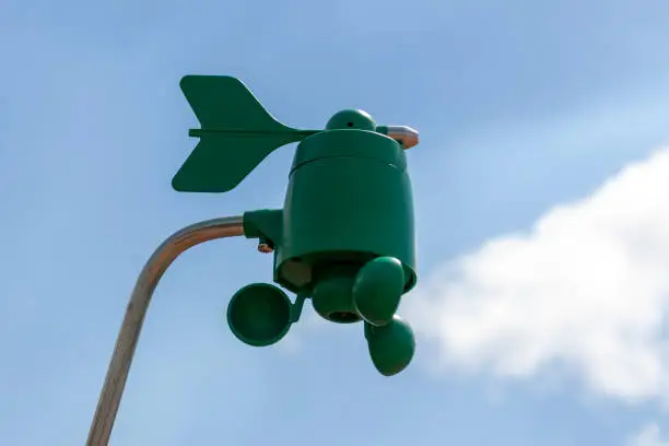 Weatherstation with anemometer, a meteorological instrument used to measure the wind speed and direction.