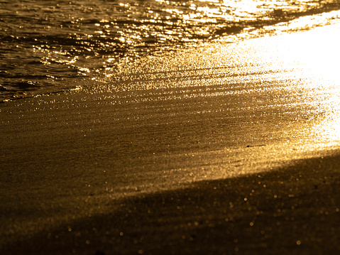 Sun-rays shining at Greek sea and it looks like liquid gold