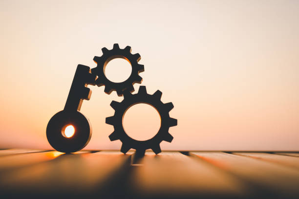 Key model and gear model with evening sky Key concepts for success, methods, systems of reaching goals