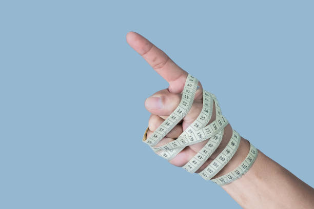 istock Hand-holding plastic bag on blue background, Recycling concept. 1479893449