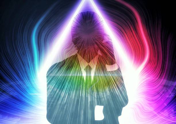 3d illustration composite light effect on silhouette of man meditating in religion concept