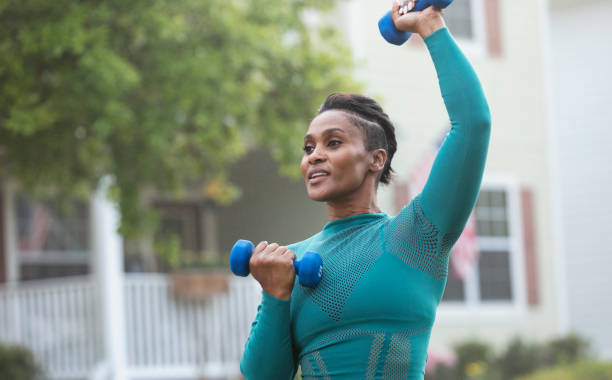 istock African-American woman exercising with handweights 1479895439