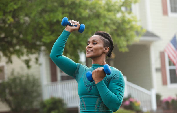 istock African-American woman exercising with handweights 1479895444
