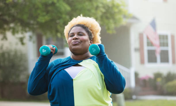 istock African-American woman exercising with handweights 1479895449