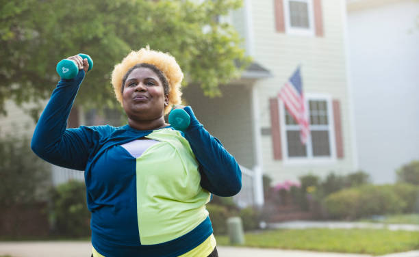 istock African-American woman exercising with handweights 1479895452