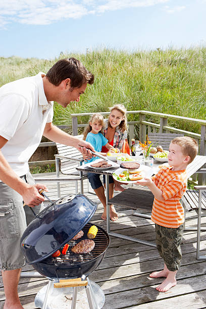 istock Family on vacation having barbecue 147989658