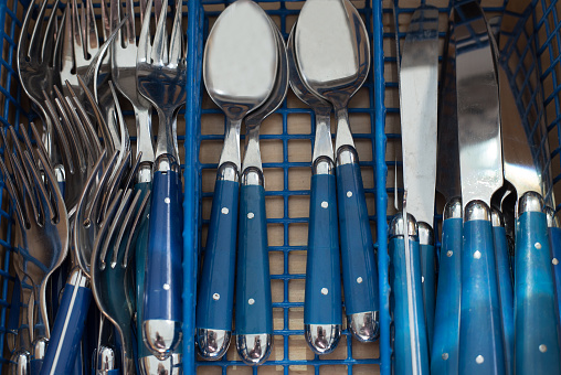 Silverware Drawer with Modern Blue Forks, Spoons, Knives