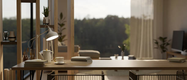 istock Copy space on a table in modern contemporary living room. Home workspace concept. 1479908718