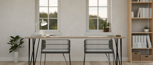 istock Minimalist home workspace against the window, chairs, bookshelf and houseplant. 1479908721