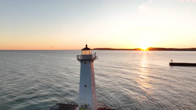 Early winter morning aerial video of Sodus Point Lighthouse, Sodus, New York.