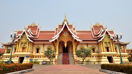 Thar Luang Monastery（luán）in Vientiane, Laos.\nThar Luang Monastery（luán）is a Buddhist shrine in Laos. Thar Luang is a unique building that Lao people are proud of, its architectural form, layout and structure are renowned. Built in 737 AD, it is considered a national treasure of Laos,\nThe top of the main tower is gilded, shining with gold in the sun. After it was rebuilt in the 1930s, it became the most important pagoda in the hearts of the Lao people.\nThis is the office building inside the Thar Luang Monastery\n(Pagoda Luang Temple) scenic spot.