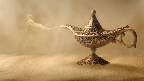 istock Golden Arabian lamp with white smoke 1479917071