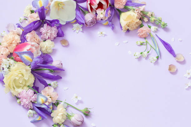 istock beautiful spring flowers on paper background 1479917378