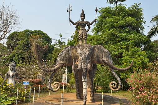 Vientiane, Laos.\nXieng Khuan Buddha Park, is located on the Mekong River about 25 kilometers southeast of Vientiane. Xieng Khuan means city of spirits. It is a sculpture park with more than 200 Buddha statues in a variety of shapes, blending Buddhist and Hindu styles.\nIt was built in 1958, it is now one of Vientiane's most famous tourist attractions.