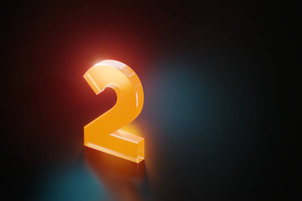 istock Orange Number Two Glowing On Black Background 1479926206