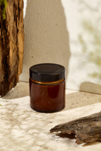 istock Empty jar for cosmetics. Mockup for natural cosmetics. Aesthetic composition with aromatic candle in jar. Mockup soy wax candle in natural style. Handmade spa product in glass jar. 1479927758