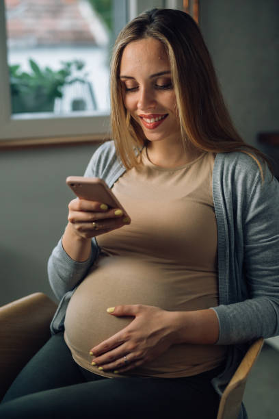 istock pregnant woman at home 1479931977