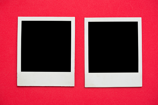 Photo frames on red background
