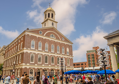 Boston, Massachusetts, New England, USA - August 20, 2012. Faneuil Hall was built in 1740–1742 and is one of the oldest buildings in Boston and a well-known stop on the Freedom Trail.