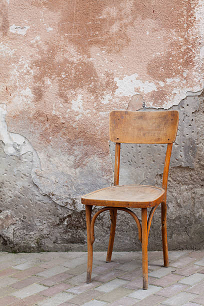 istock Vintage chair near old wall 147993423