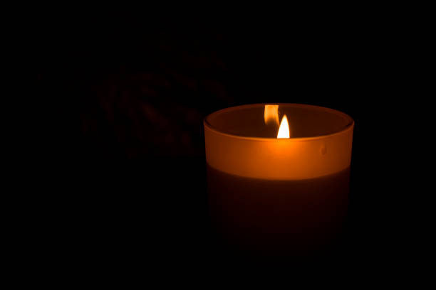 Candle lights on the dark background, romantic scenery