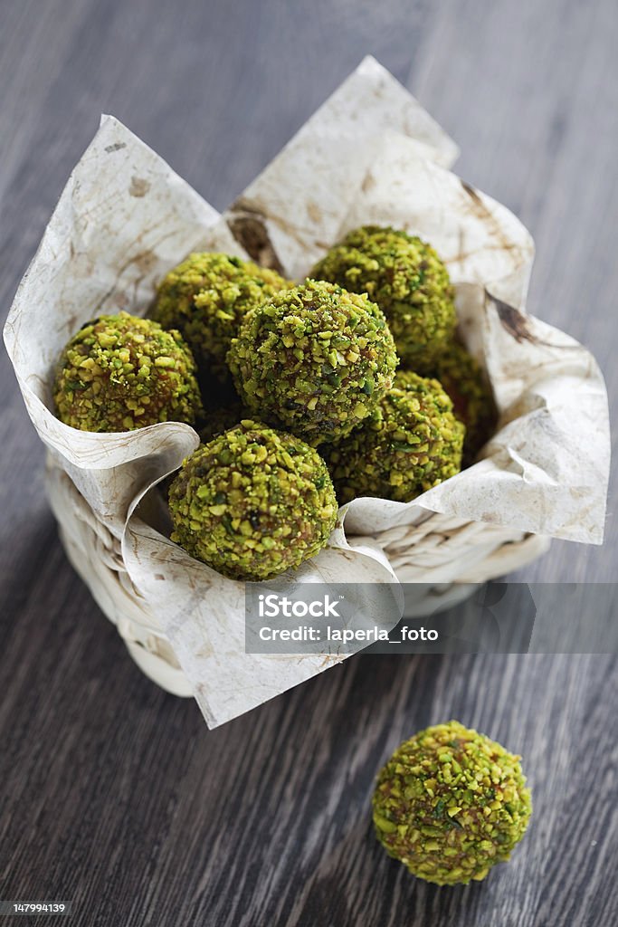 Pistachio candy Homemade candy of dried fruits, chocolate and pistachio, selective focus Pistachio Stock Photo