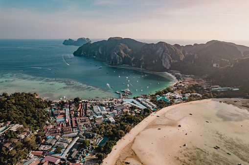 The Phi Phi Islands are an island group in Thailand between the large island of Phuket and the Straits of Malacca coast of Thailand. The islands are administratively part of Krabi Province.