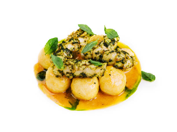 istock Baked fish fillet and potatoes isolated on white 1479951136