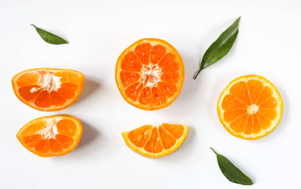 istock a cut orange, isolated on a white background 1479952417