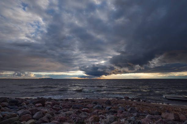 istock Approach of thunderstorm cloud at sunset. 1479956177