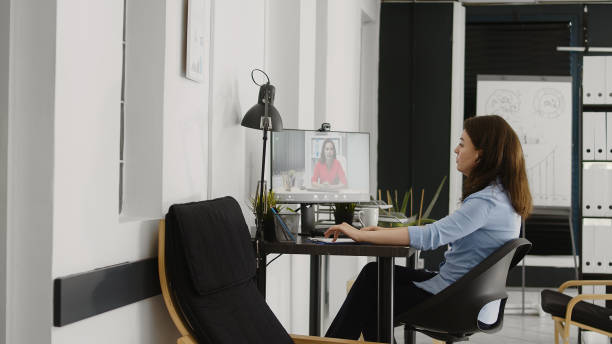 istock Business woman using video call meeting on computer 1479974495