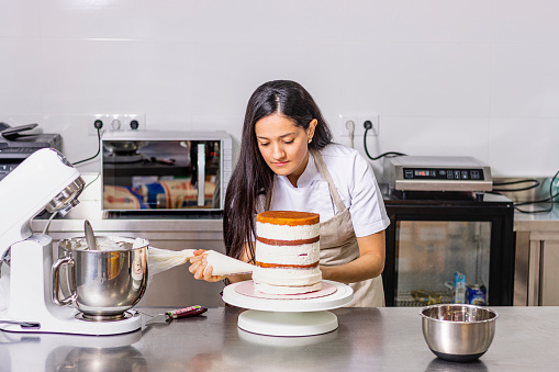 Colombian Pastry Chef. Professional kitchen. Chef at work.