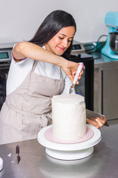 istock Colombian Pastry Chef. Working in a professional kitchen. 1479974558