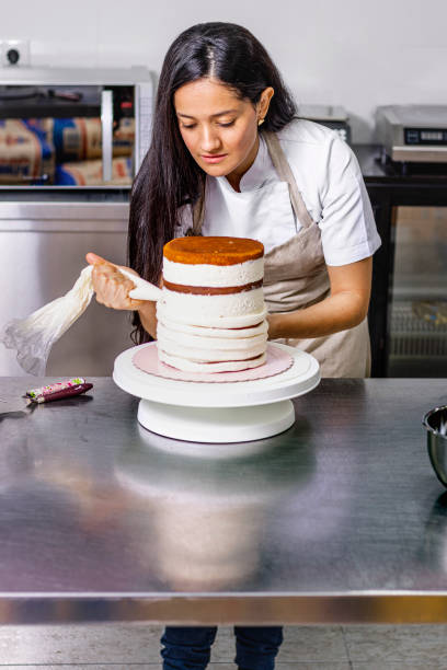 istock Colombian Pastry Chef. Professional kitchen. Chef at work. 1479974569
