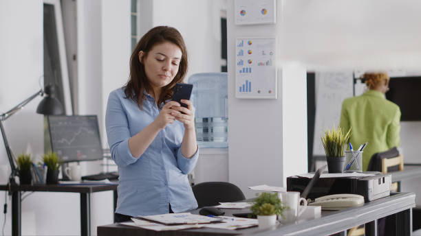 istock Business worker browsing website on smartphone 1479974573