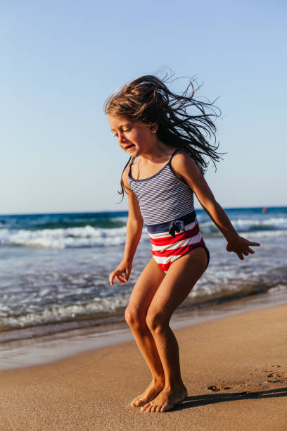 istock Girl cheering on a summer day 1479976364