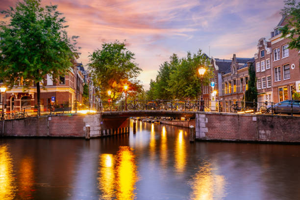 istock Bridge over an Amsterdam Canal in sunset. 1479986152