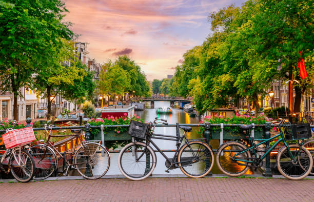 istock Bridge over an Amsterdam Canal in sunset. 1479986158
